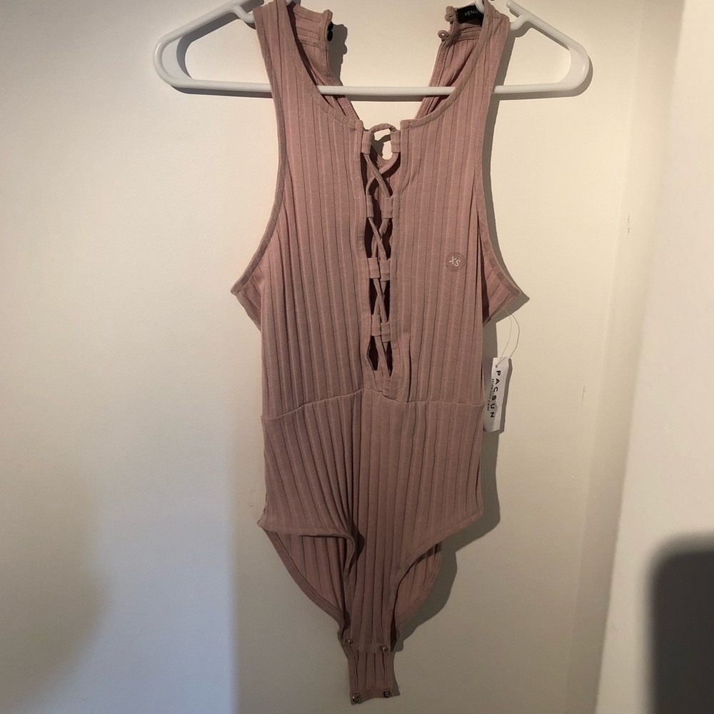 Pink body suit